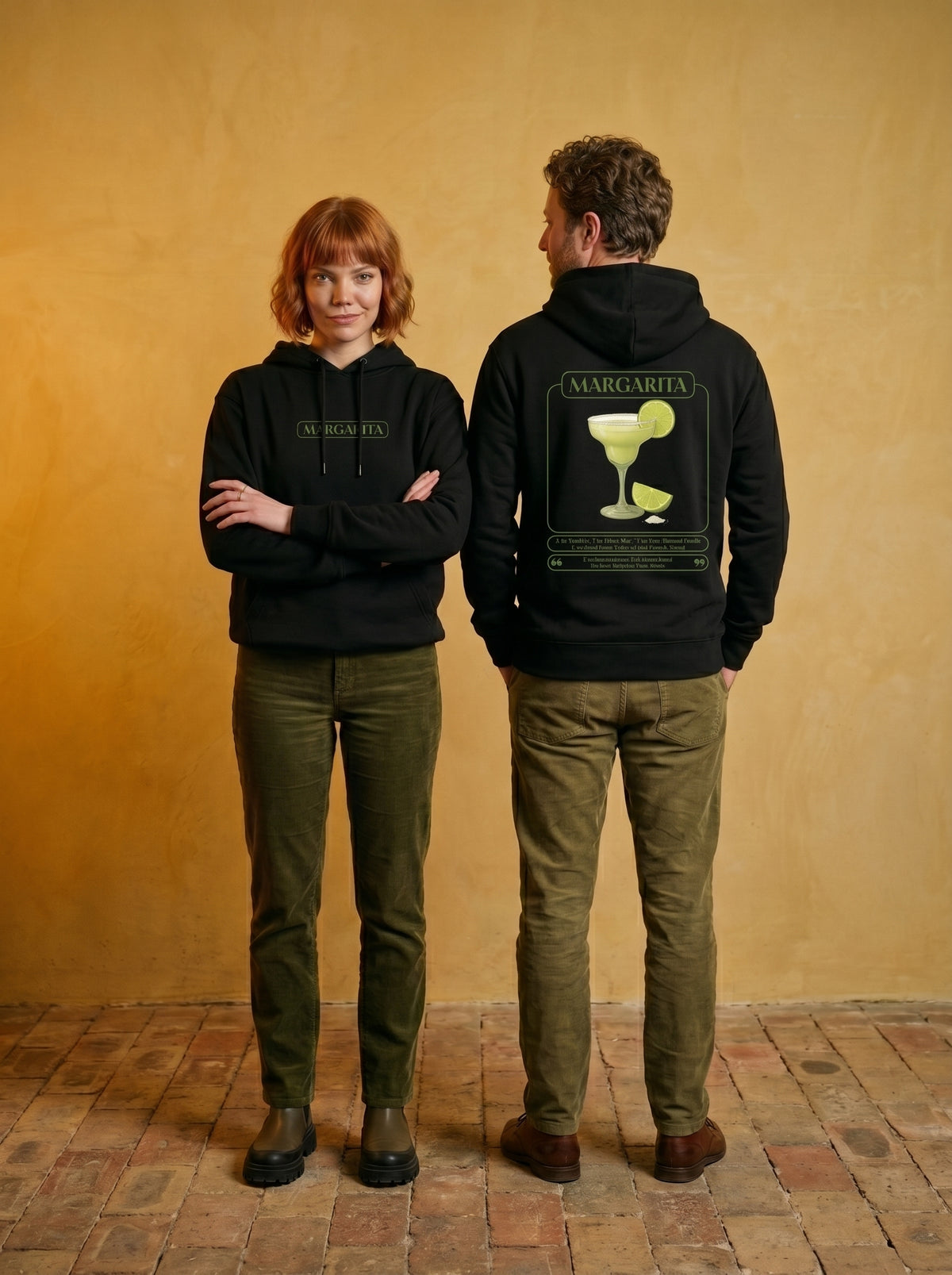 Mr.B Margarita Hoodie · Siyah · Lisa ve Nathan ürünü giyerken (kurgusal karakterler, görsel yapay zekâ ile üretildi)